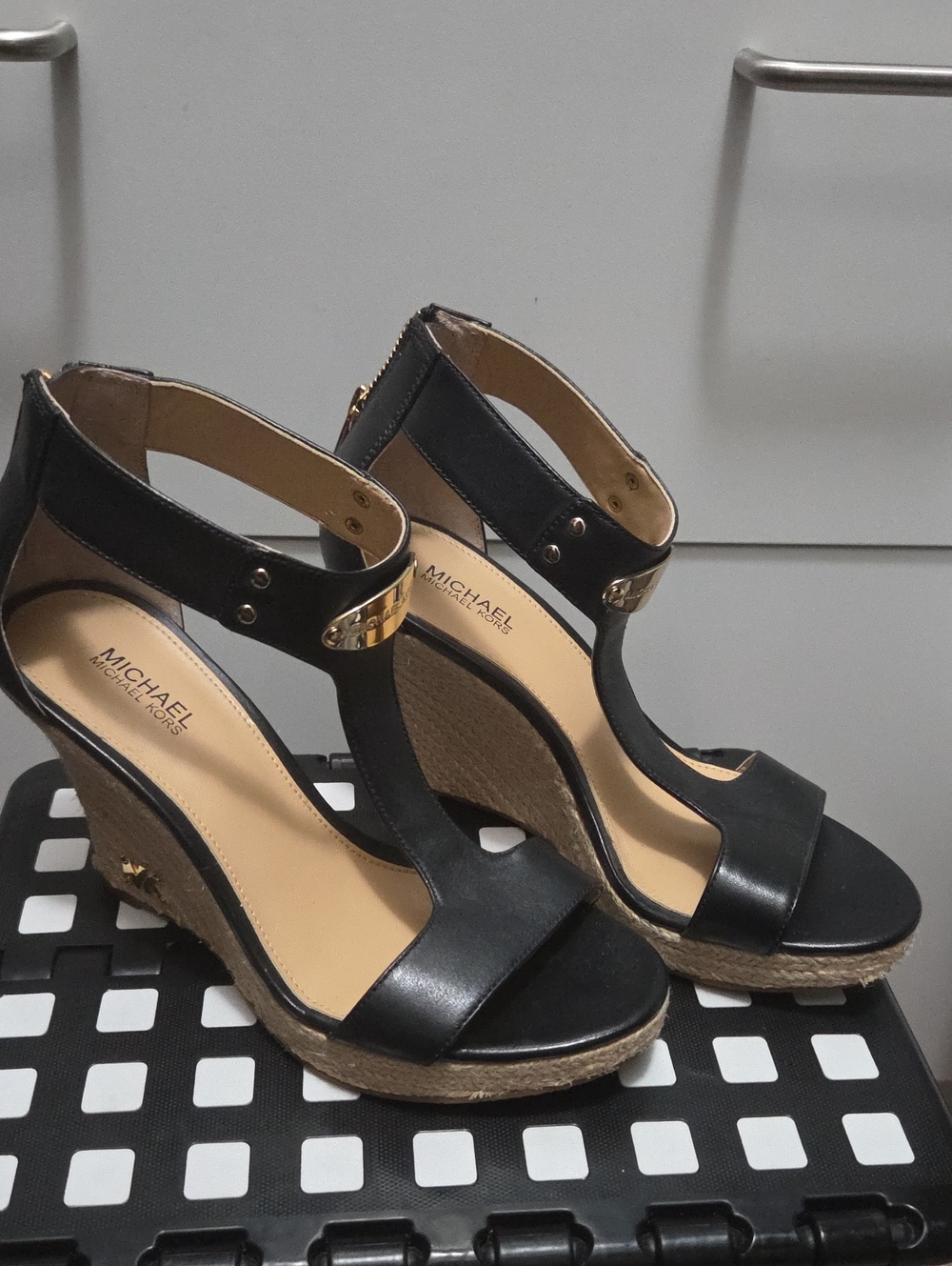 MICHAEL Michael Kors Black Leather Wedge Sandals with Gold Accents